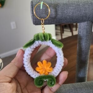 Handmade White and Green Keychain with Orange Flower